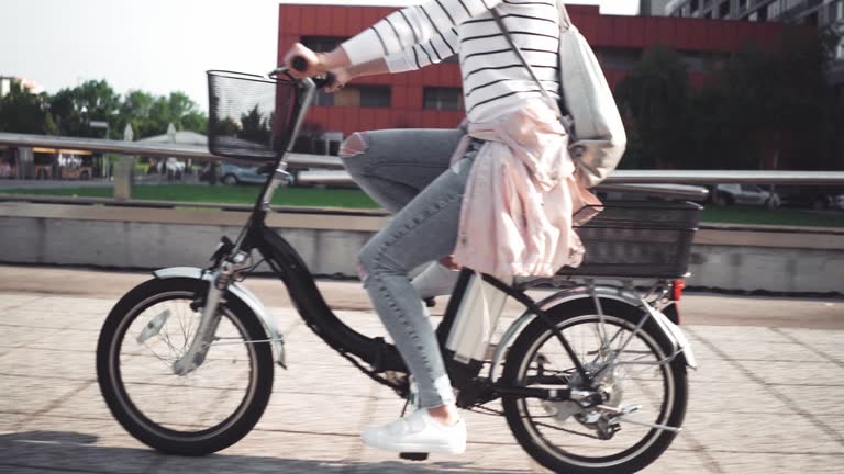 Woman riding e-bike in Norfolk